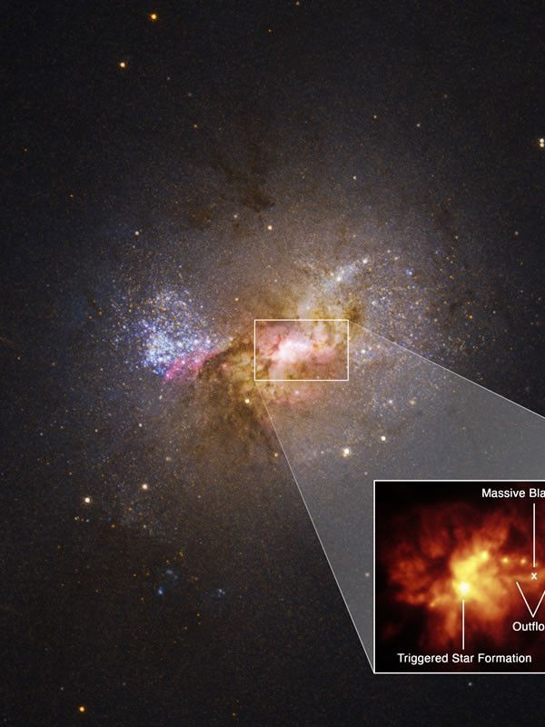 Descubren un agujero negro que provoca la formación estelar en una galaxia enana