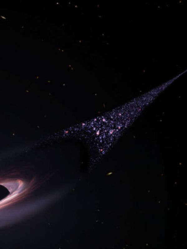 El Hubble observa un posible agujero negro fuera de control creando un rastro de estrellas